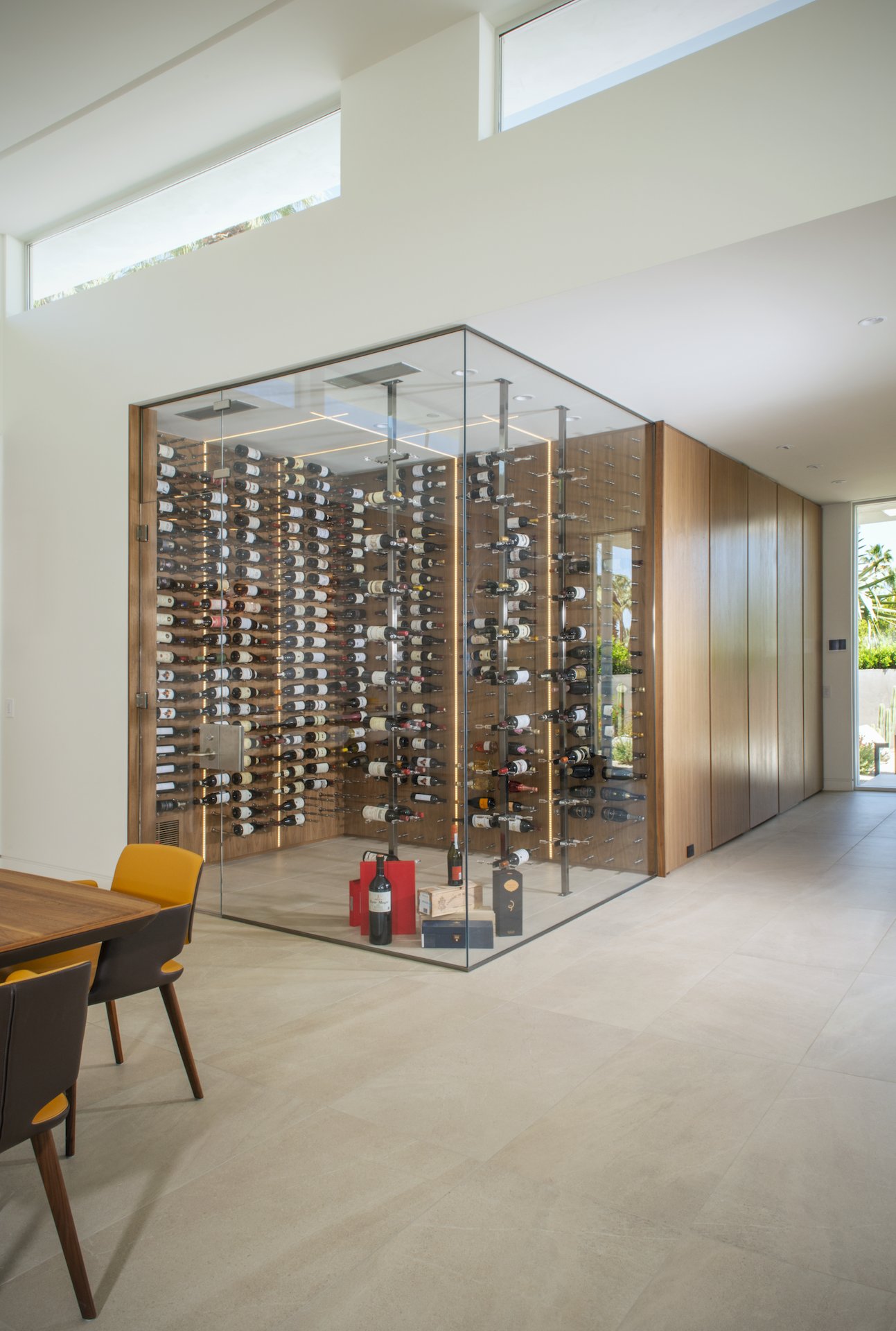 The glass-enclosed wine cellar at Above Palm Springs Sanctuary